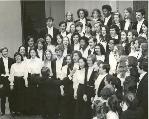 Black and white photograph of 1970s era Yale Glee Club members performing